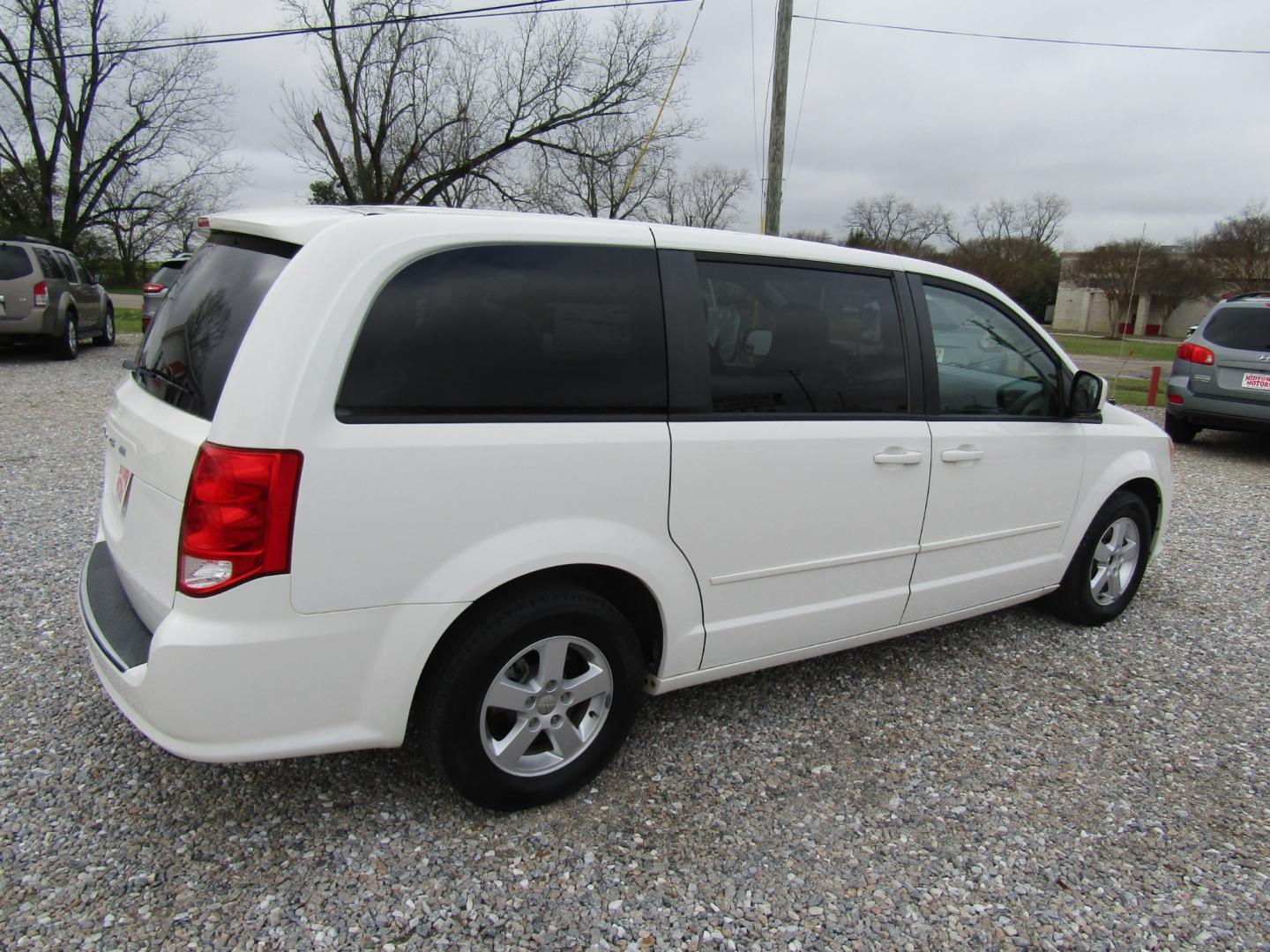 2012 White Dodge Grand Caravan SE (2C4RDGBG5CR) with an 3.6L V6 DOHC 24V engine, Automatic transmission, located at 15016 S Hwy 231, Midland City, AL, 36350, (334) 983-3001, 31.306210, -85.495277 - Photo#8